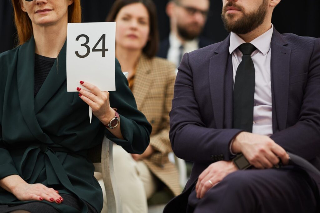  How can I improve my auction bidding skills?